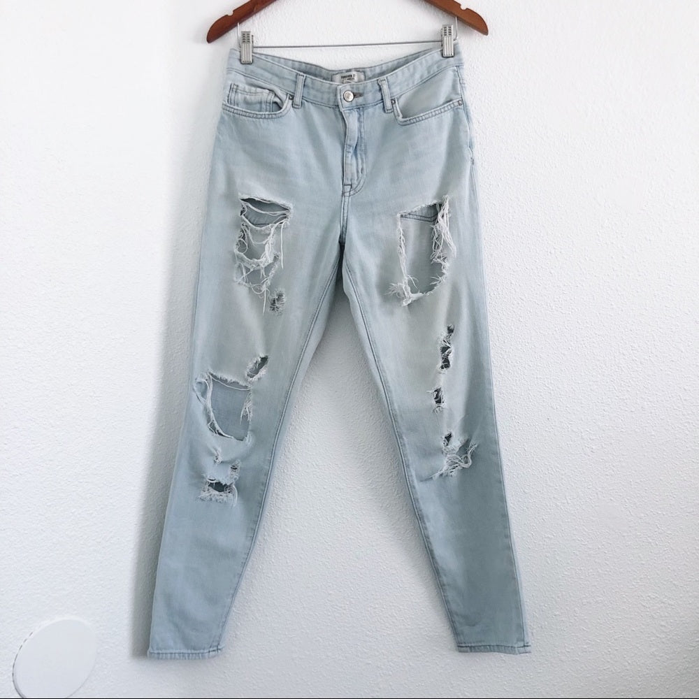 Distressed Light Wash Blue Denim Jean Pants