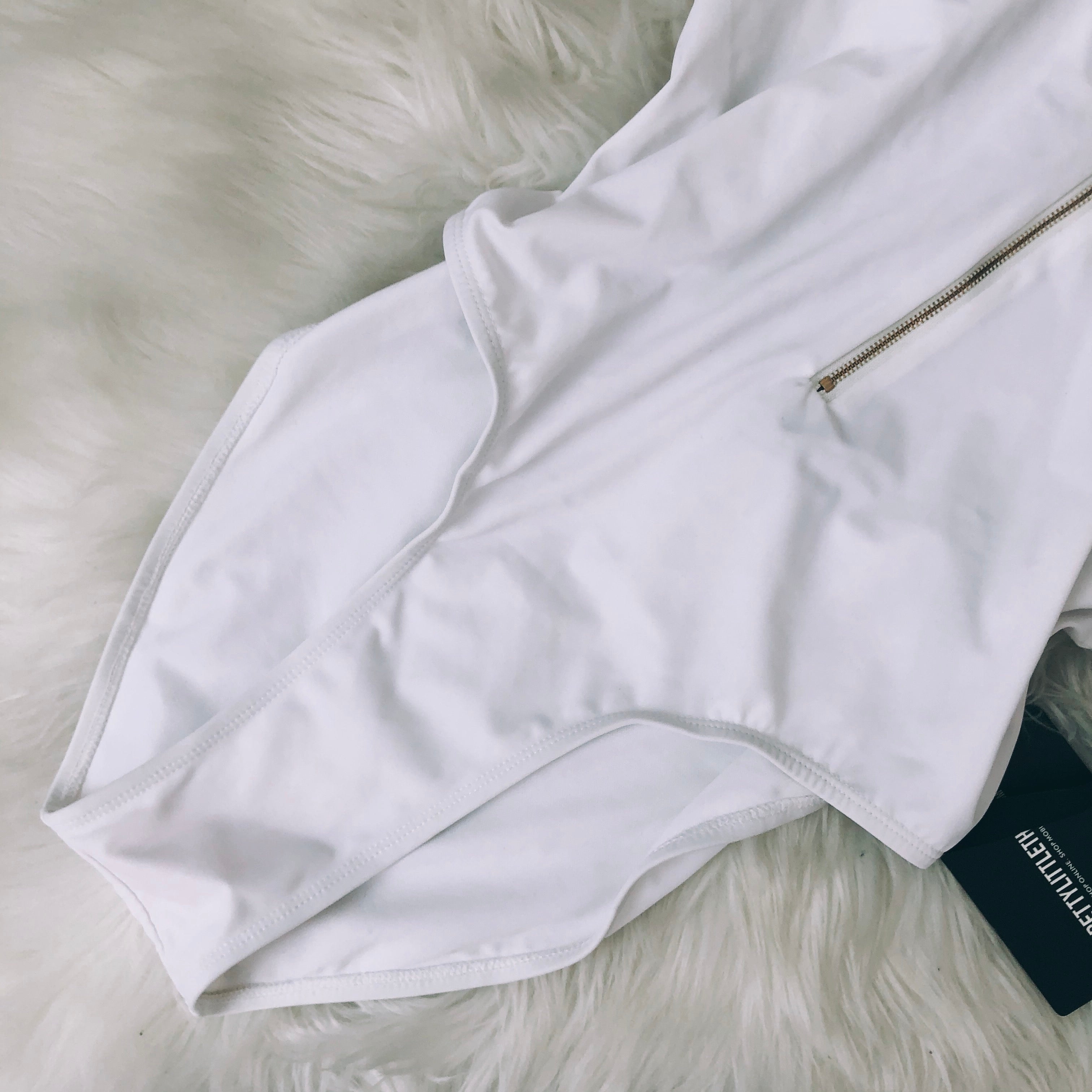 Cloud 9 Pretty Little Thing White Zip Up Bodysuit